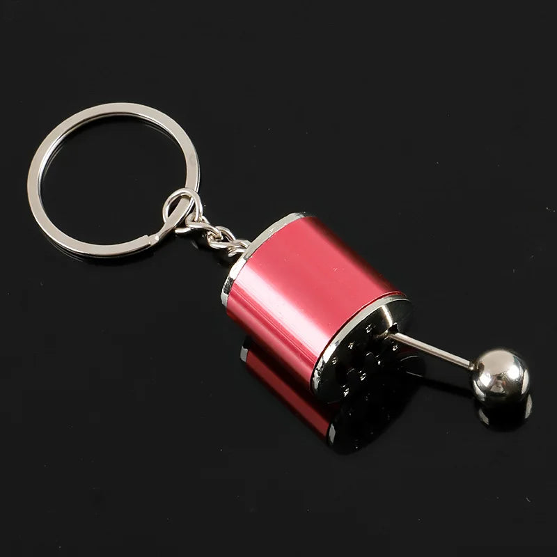 Palanca Turbo en tu Bolsillo – Llavero Deportivo Antiestrés de 6 Velocidades